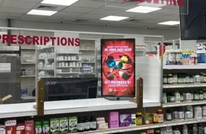 dolphin digital ooh screen in pharmacy